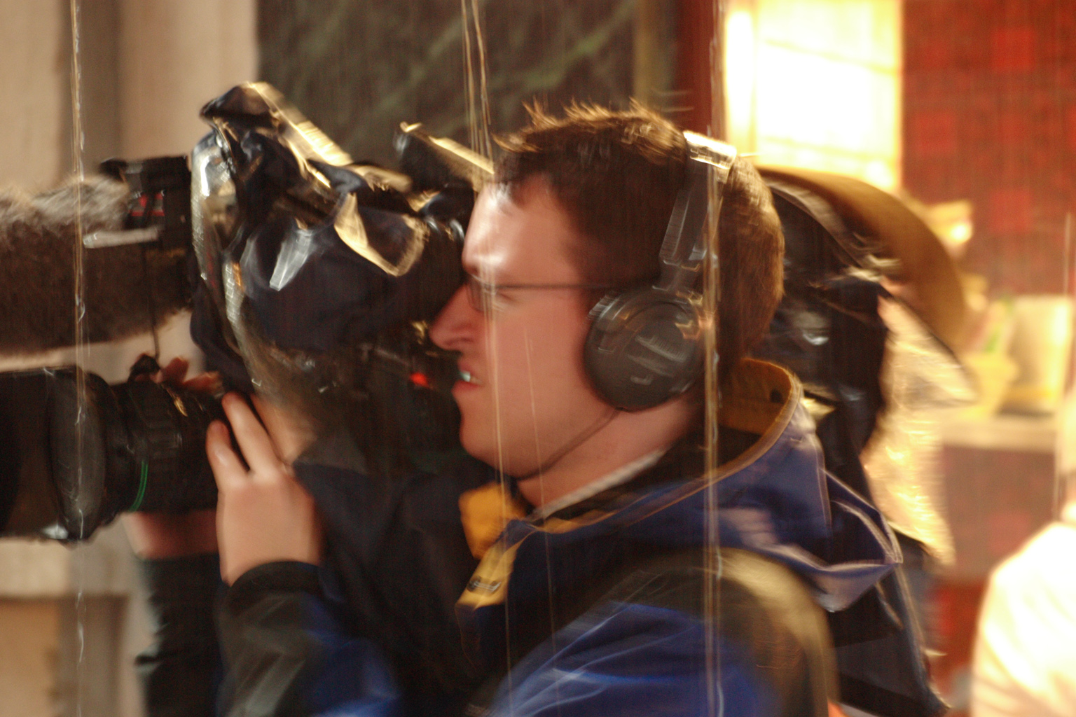 People queueing up for the Harry Potter book launch in London, poor sod having to come out in such weather to film eccentrics!