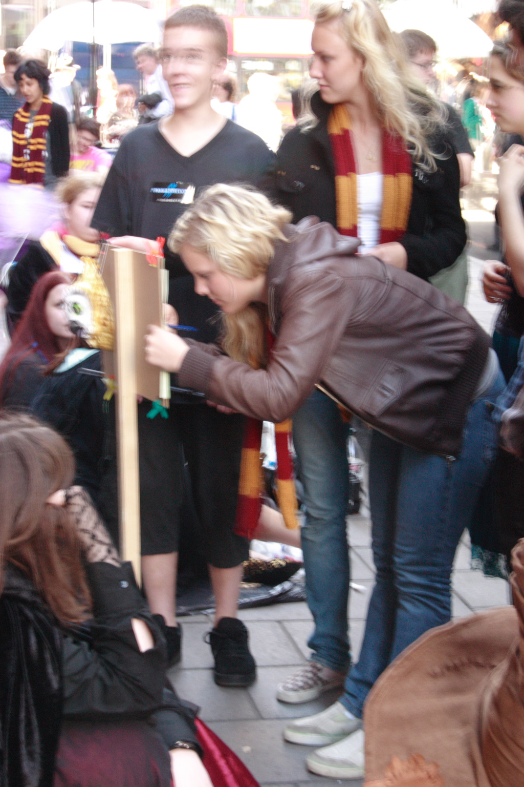 People queueing up for the Harry Potter book launch in London, signing up for Dumbledores Army now!