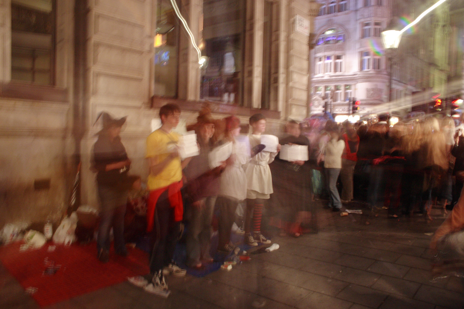People queueing up for the Harry Potter book launch in London, ok a semi successful attempt at making ghosts join the queue